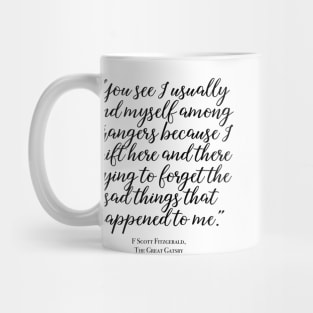 Among strangers - Fitzgerald quote Mug